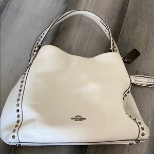 Coach bag. Leather and off white in color